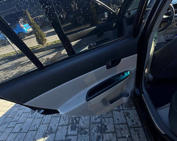 Черный Хендай Акцент, объемом двигателя 1.4 л и пробегом 210 тыс. км за 4050 $, фото 5 на Automoto.ua