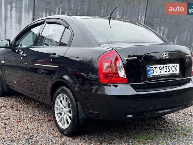 Черный Хендай Акцент, объемом двигателя 1.4 л и пробегом 139 тыс. км за 5999 $, фото 24 на Automoto.ua