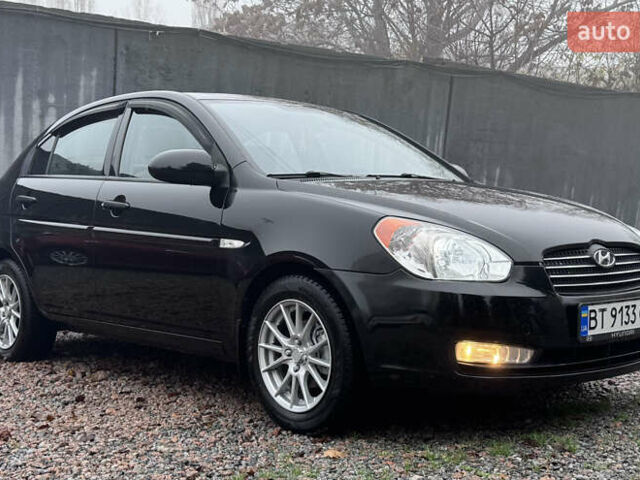 Черный Хендай Акцент, объемом двигателя 1.4 л и пробегом 139 тыс. км за 5999 $, фото 6 на Automoto.ua