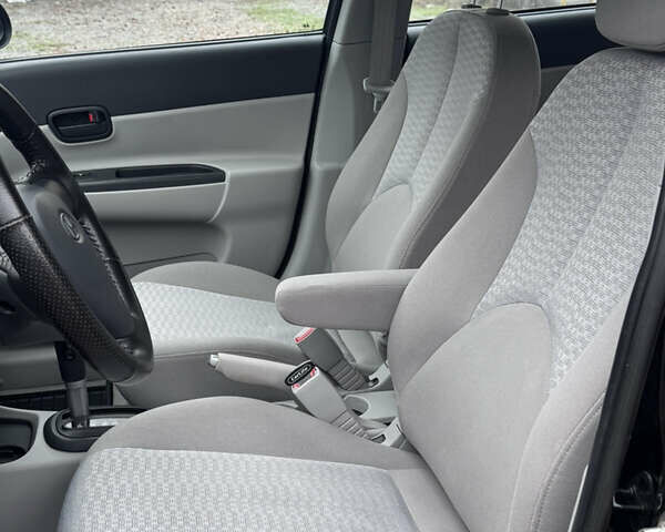 Черный Хендай Акцент, объемом двигателя 1.4 л и пробегом 139 тыс. км за 5999 $, фото 31 на Automoto.ua