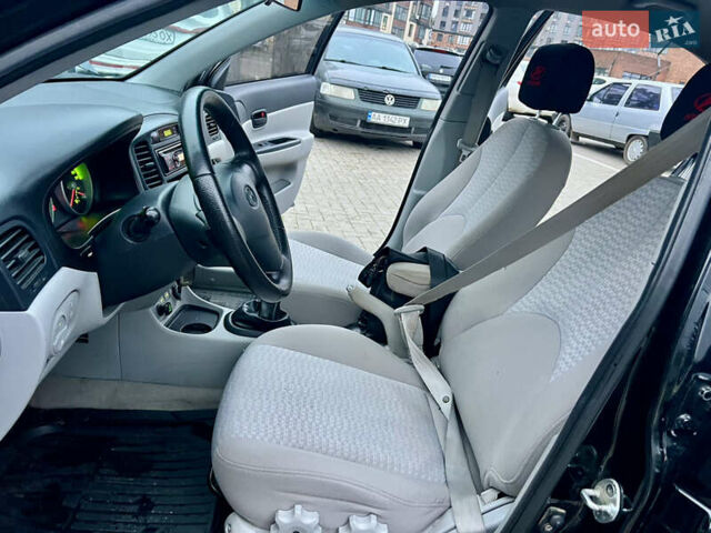 Черный Хендай Акцент, объемом двигателя 1.4 л и пробегом 221 тыс. км за 4950 $, фото 30 на Automoto.ua