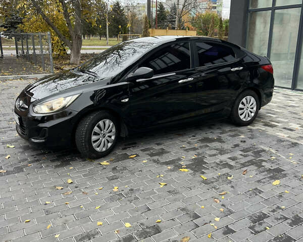 Хендай Акцент 2011 в Полтаве на Automoto.ua Черный Хендай Акцент, объемом двигателя 1.4 л и пробегом 186 тыс. км за 5999 $, фото 9 на Automoto.ua