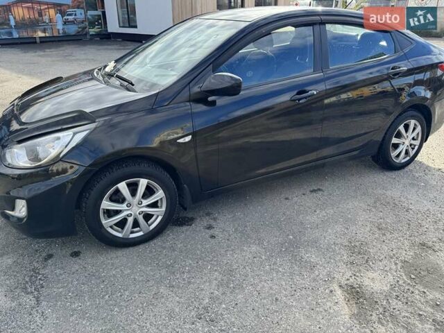 Черный Хендай Акцент, объемом двигателя 1.4 л и пробегом 117 тыс. км за 7500 $, фото 2 на Automoto.ua