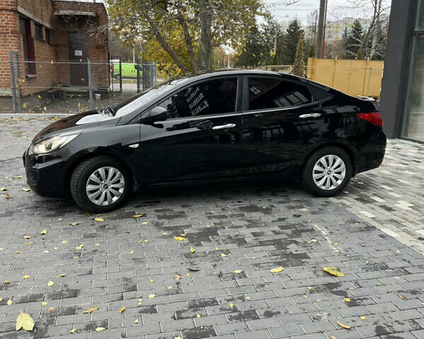 Хендай Акцент 2011 в Полтаве на Automoto.ua Черный Хендай Акцент, объемом двигателя 1.4 л и пробегом 186 тыс. км за 5999 $, фото 10 на Automoto.ua