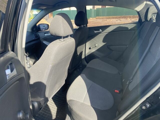 Черный Хендай Акцент, объемом двигателя 1.4 л и пробегом 213 тыс. км за 6250 $, фото 7 на Automoto.ua