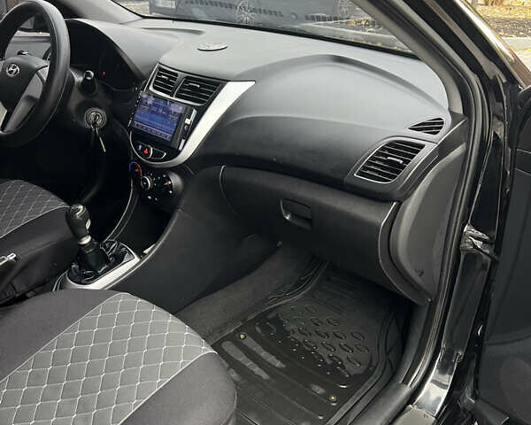 Хендай Акцент 2011 в Полтаве на Automoto.ua Черный Хендай Акцент, объемом двигателя 1.4 л и пробегом 186 тыс. км за 5999 $, фото 26 на Automoto.ua