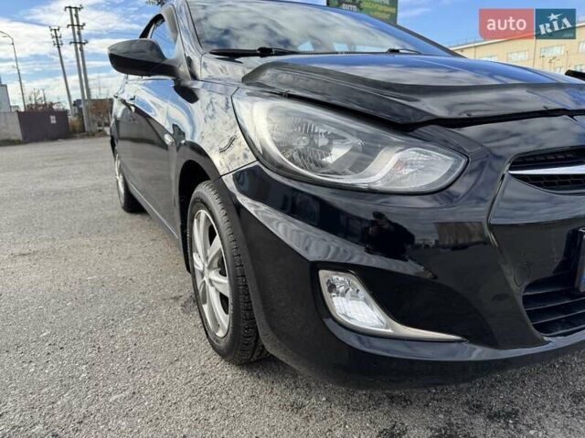 Черный Хендай Акцент, объемом двигателя 1.4 л и пробегом 117 тыс. км за 7500 $, фото 1 на Automoto.ua