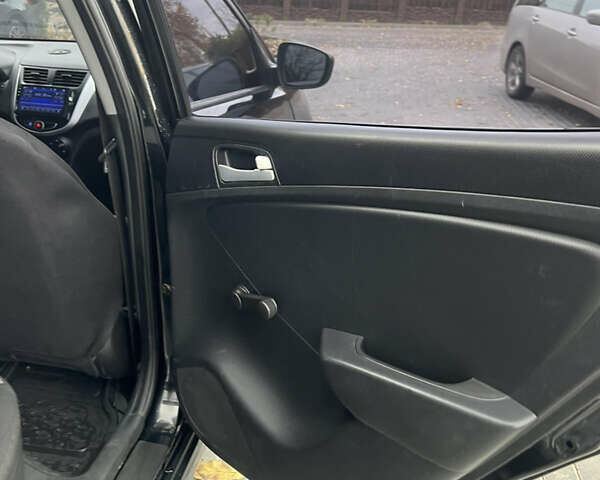 Хендай Акцент 2011 в Полтаве на Automoto.ua Черный Хендай Акцент, объемом двигателя 1.4 л и пробегом 186 тыс. км за 5999 $, фото 29 на Automoto.ua