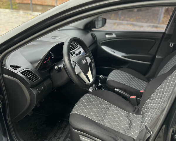 Хендай Акцент 2011 в Полтаве на Automoto.ua Черный Хендай Акцент, объемом двигателя 1.4 л и пробегом 186 тыс. км за 5999 $, фото 20 на Automoto.ua