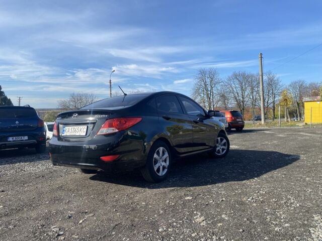 Черный Хендай Акцент, объемом двигателя 1.4 л и пробегом 213 тыс. км за 6250 $, фото 3 на Automoto.ua