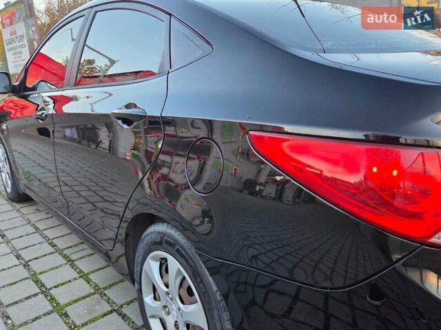 Хендай Акцент 2011 у Києві на Automoto.ua Чорний Хендай Акцент, об'ємом двигуна 1.6 л та пробігом 114 тис. км за 7999 $, фото 19 на Automoto.ua