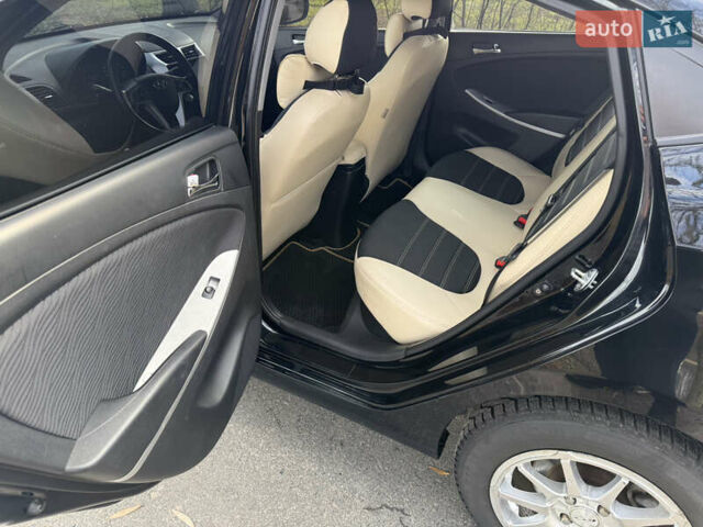 Черный Хендай Акцент, объемом двигателя 1.4 л и пробегом 120 тыс. км за 7900 $, фото 24 на Automoto.ua