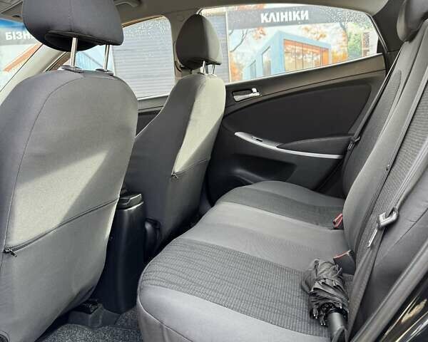Черный Хендай Акцент, объемом двигателя 1.4 л и пробегом 117 тыс. км за 7500 $, фото 25 на Automoto.ua