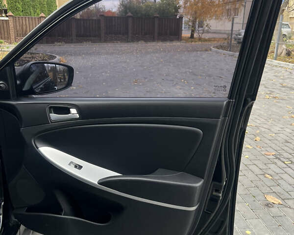 Хендай Акцент 2011 в Полтаве на Automoto.ua Черный Хендай Акцент, объемом двигателя 1.4 л и пробегом 186 тыс. км за 5999 $, фото 30 на Automoto.ua