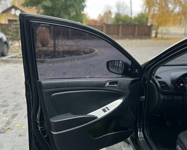 Хендай Акцент 2011 в Полтаве на Automoto.ua Черный Хендай Акцент, объемом двигателя 1.4 л и пробегом 186 тыс. км за 5999 $, фото 21 на Automoto.ua