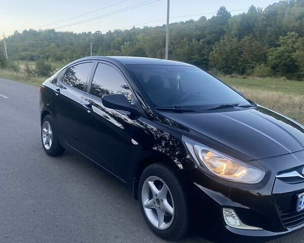 Черный Хендай Акцент, объемом двигателя 1.4 л и пробегом 160 тыс. км за 7212 $, фото 2 на Automoto.ua