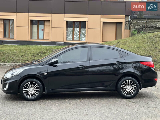 Черный Хендай Акцент, объемом двигателя 1.4 л и пробегом 141 тыс. км за 7500 $, фото 1 на Automoto.ua