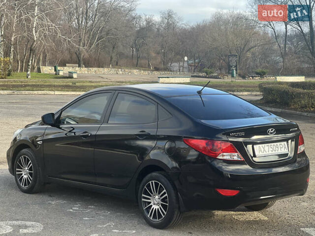 Черный Хендай Акцент, объемом двигателя 1.4 л и пробегом 141 тыс. км за 7500 $, фото 13 на Automoto.ua