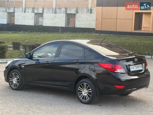 Черный Хендай Акцент, объемом двигателя 1.4 л и пробегом 141 тыс. км за 7500 $, фото 2 на Automoto.ua