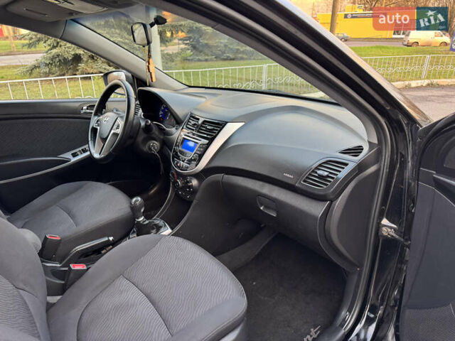 Черный Хендай Акцент, объемом двигателя 1.4 л и пробегом 146 тыс. км за 6950 $, фото 16 на Automoto.ua