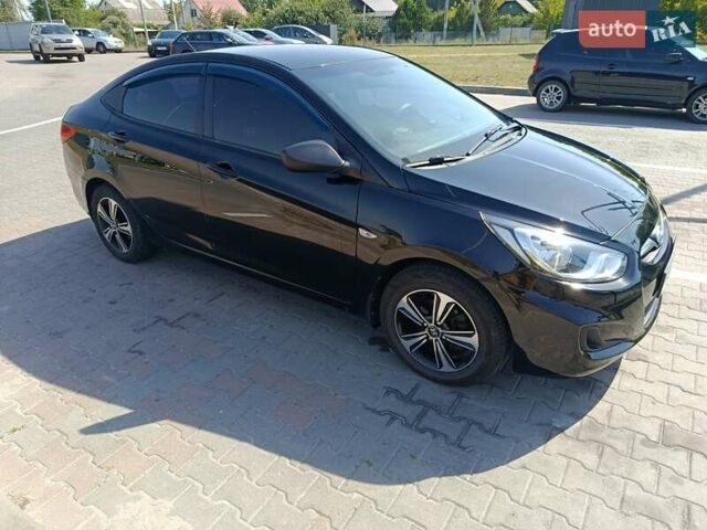 Хендай Акцент 2013 в Ирпене на Automoto.ua Черный Хендай Акцент, объемом двигателя 1.4 л и пробегом 215 тыс. км за 7800 $, фото 11 на Automoto.ua