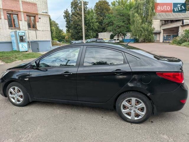 Хендай Акцент 2013 в Сумах на Automoto.ua Черный Хендай Акцент, объемом двигателя 1.4 л и пробегом 118 тыс. км за 7300 $, фото 2 на Automoto.ua