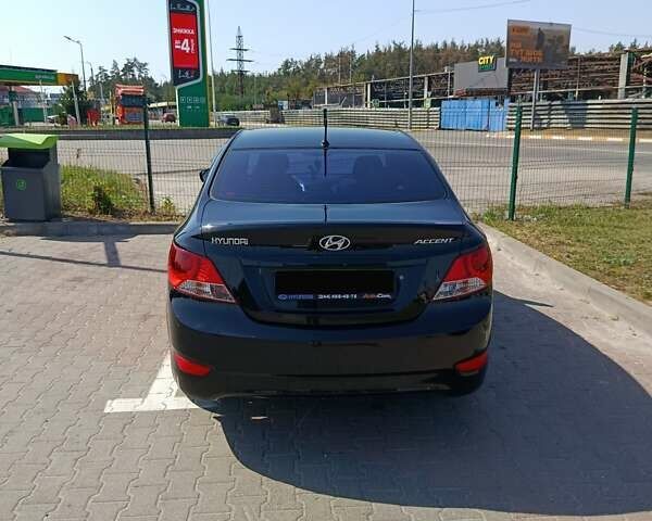 Хендай Акцент 2013 в Ирпене на Automoto.ua Черный Хендай Акцент, объемом двигателя 1.4 л и пробегом 215 тыс. км за 7800 $, фото 9 на Automoto.ua
