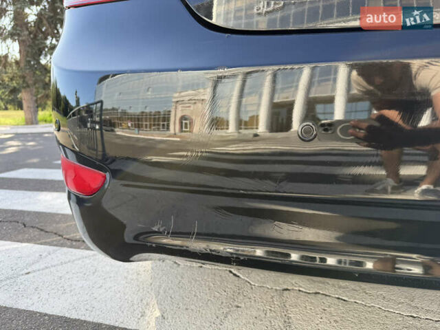 Черный Хендай Акцент, объемом двигателя 1.4 л и пробегом 207 тыс. км за 6099 $, фото 14 на Automoto.ua