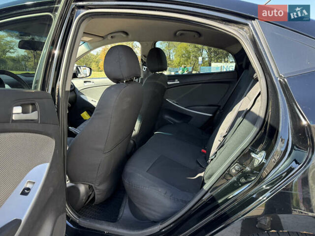 Черный Хендай Акцент, объемом двигателя 1.4 л и пробегом 207 тыс. км за 6099 $, фото 12 на Automoto.ua