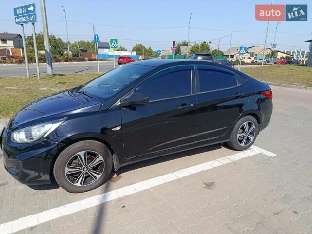 Хендай Акцент 2013 в Ирпене на Automoto.ua Черный Хендай Акцент, объемом двигателя 1.4 л и пробегом 215 тыс. км за 7800 $, фото 7 на Automoto.ua