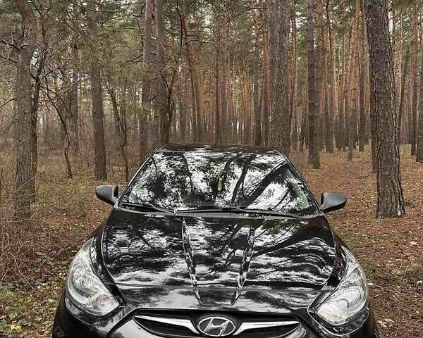 Чорний Хендай Акцент, об'ємом двигуна 1.4 л та пробігом 142 тис. км за 7600 $, фото 1 на Automoto.ua