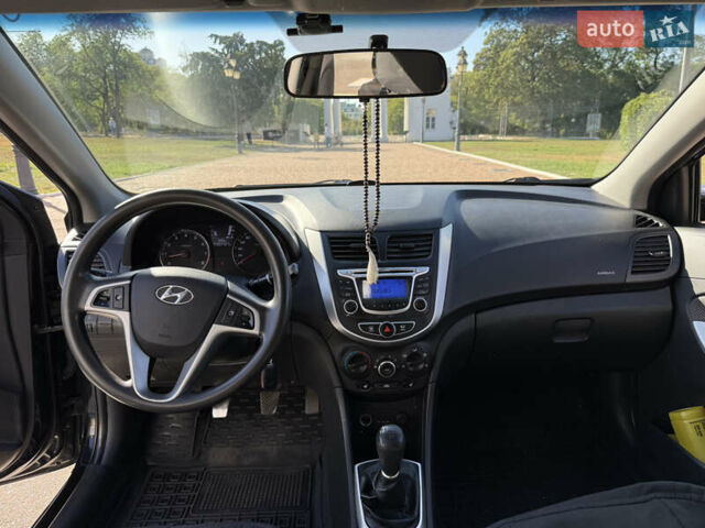Черный Хендай Акцент, объемом двигателя 1.4 л и пробегом 207 тыс. км за 6099 $, фото 6 на Automoto.ua