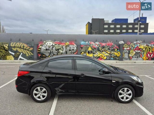 Черный Хендай Акцент, объемом двигателя 1.4 л и пробегом 177 тыс. км за 9200 $, фото 1 на Automoto.ua