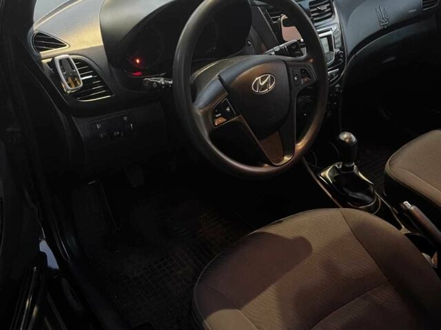 Черный Хендай Акцент, объемом двигателя 1.4 л и пробегом 112 тыс. км за 6500 $, фото 1 на Automoto.ua