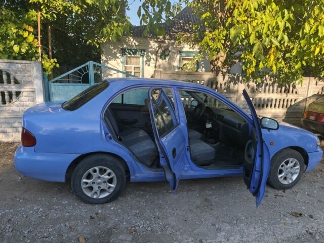 Фиолетовый Хендай Акцент, объемом двигателя 1.3 л и пробегом 315 тыс. км за 1000 $, фото 1 на Automoto.ua