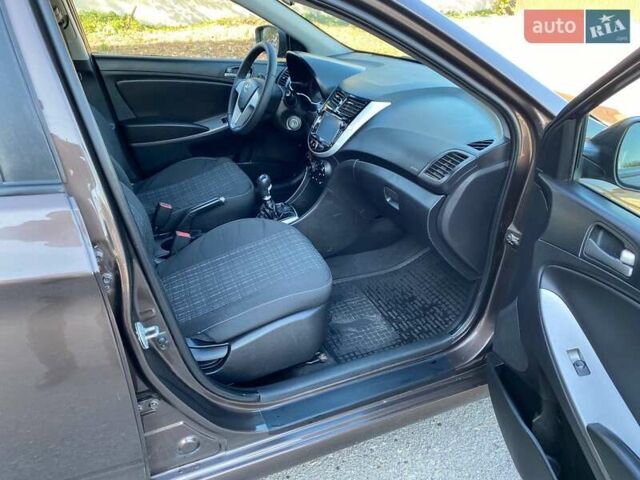 Коричневый Хендай Акцент, объемом двигателя 1.4 л и пробегом 212 тыс. км за 6899 $, фото 13 на Automoto.ua