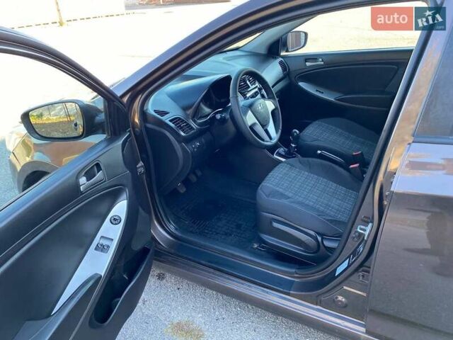 Коричневый Хендай Акцент, объемом двигателя 1.4 л и пробегом 212 тыс. км за 6899 $, фото 9 на Automoto.ua