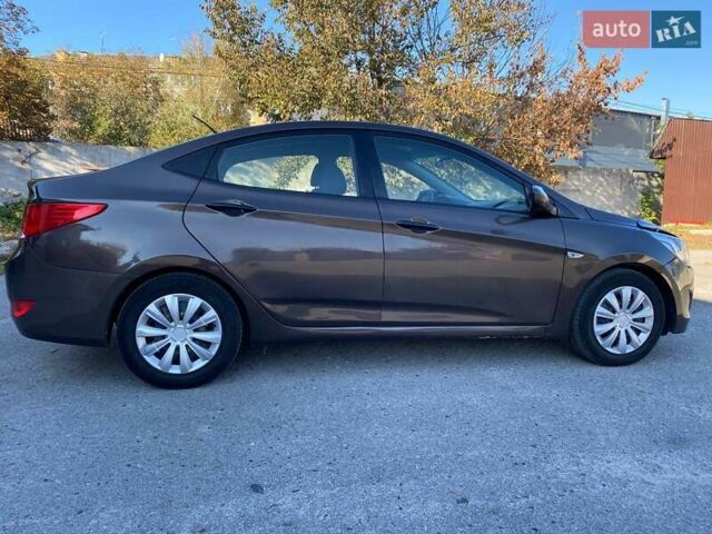 Коричневый Хендай Акцент, объемом двигателя 1.4 л и пробегом 212 тыс. км за 6899 $, фото 7 на Automoto.ua