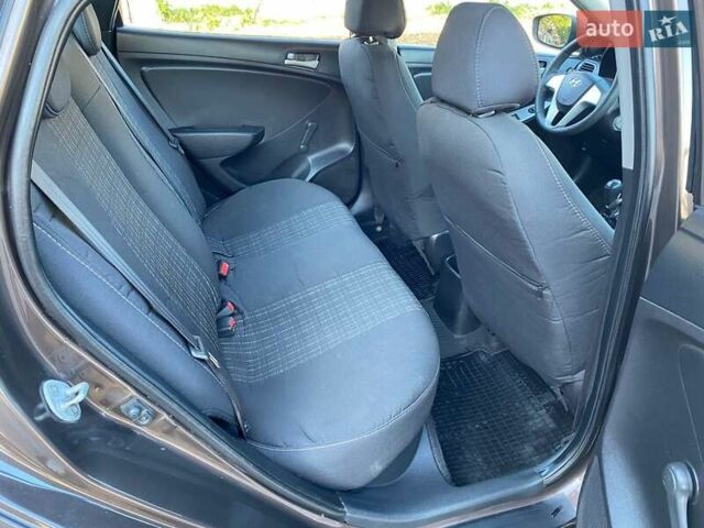 Коричневый Хендай Акцент, объемом двигателя 1.4 л и пробегом 212 тыс. км за 6899 $, фото 12 на Automoto.ua