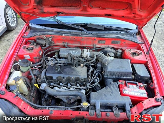 Красный Хендай Акцент, объемом двигателя 1.3 л и пробегом 380 тыс. км за 2250 $, фото 7 на Automoto.ua