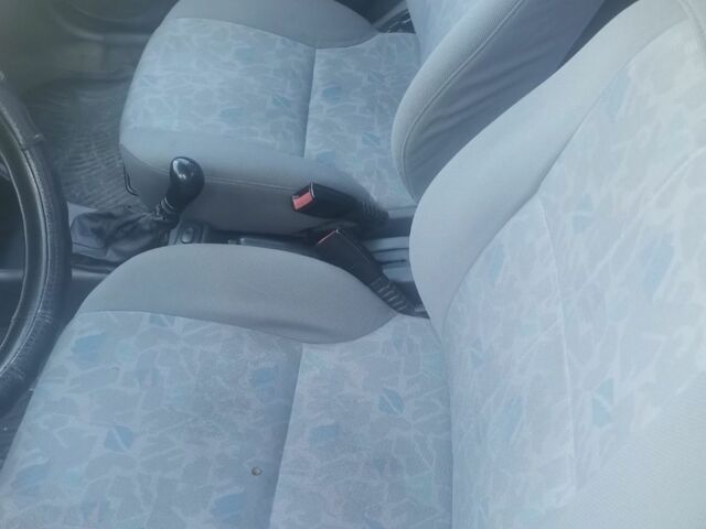 Красный Хендай Акцент, объемом двигателя 1.5 л и пробегом 230 тыс. км за 2079 $, фото 7 на Automoto.ua