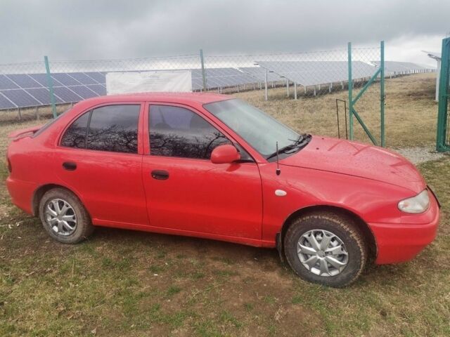 Красный Хендай Акцент, объемом двигателя 1.5 л и пробегом 230 тыс. км за 2079 $, фото 2 на Automoto.ua