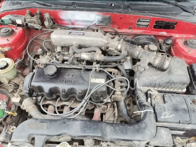 Красный Хендай Акцент, объемом двигателя 1.5 л и пробегом 230 тыс. км за 2079 $, фото 8 на Automoto.ua