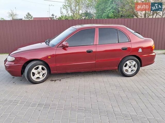 Красный Хендай Акцент, объемом двигателя 1.5 л и пробегом 294 тыс. км за 2700 $, фото 2 на Automoto.ua