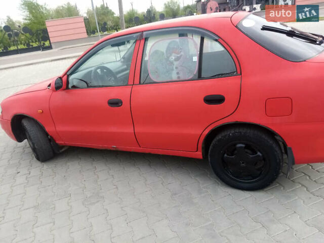 Красный Хендай Акцент, объемом двигателя 1.3 л и пробегом 250 тыс. км за 1700 $, фото 3 на Automoto.ua