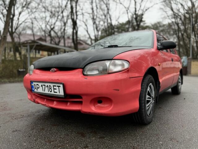 Красный Хендай Акцент, объемом двигателя 1.3 л и пробегом 300 тыс. км за 1200 $, фото 11 на Automoto.ua