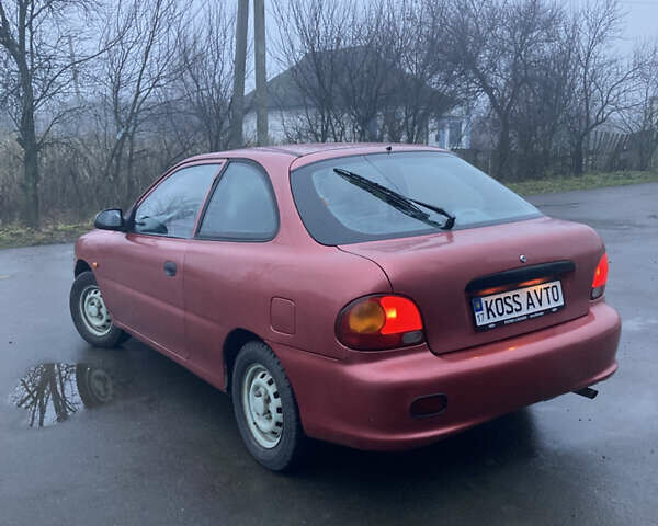 Червоний Хендай Акцент, об'ємом двигуна 1.4 л та пробігом 230 тис. км за 1750 $, фото 2 на Automoto.ua