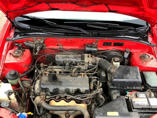 Красный Хендай Акцент, объемом двигателя 1.5 л и пробегом 330 тыс. км за 3200 $, фото 12 на Automoto.ua