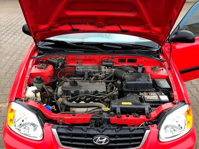 Красный Хендай Акцент, объемом двигателя 1.5 л и пробегом 330 тыс. км за 3200 $, фото 10 на Automoto.ua