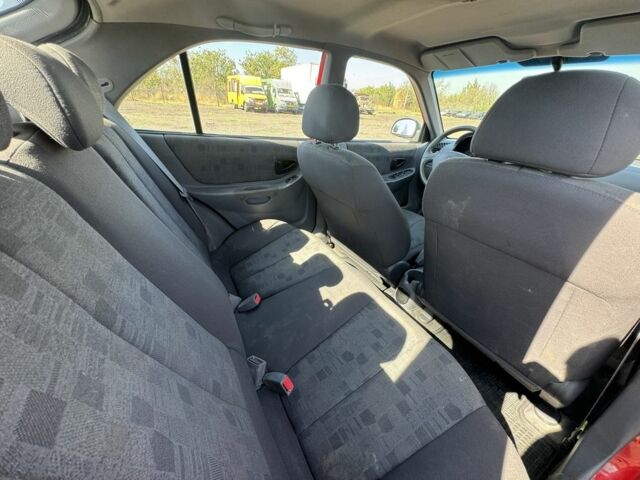 Червоний Хендай Акцент, об'ємом двигуна 1.6 л та пробігом 161 тис. км за 1700 $, фото 13 на Automoto.ua